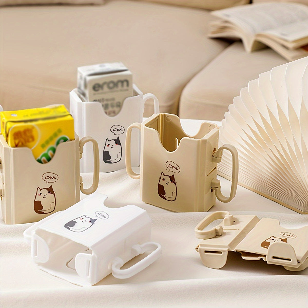 Milk carton holder featuring a cute cat design, made with spill-proof polycarbonate material. This drink support bracket is food contact safe and keeps beverages upright.