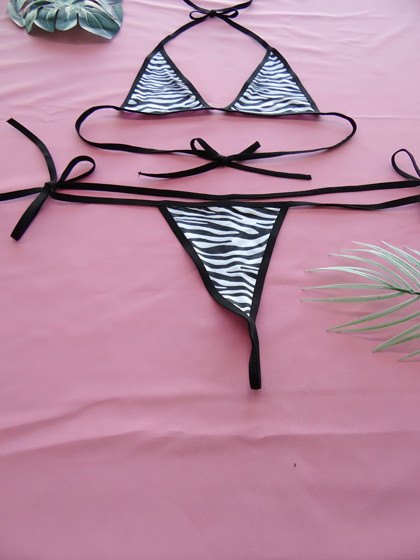 Women's zebra print bikini in sizes S/L, comfortable fit.