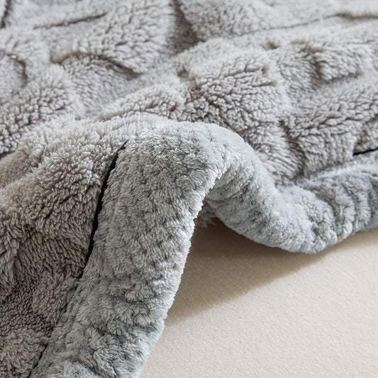 Stay warm and stylish with our cozy contemporary fleece blanket. This thick plush faux cashmere throw features a heart pattern and a solid color design. It's perfect for snuggling up on the sofa, bed, or taking on your travels or camping trips. Made from