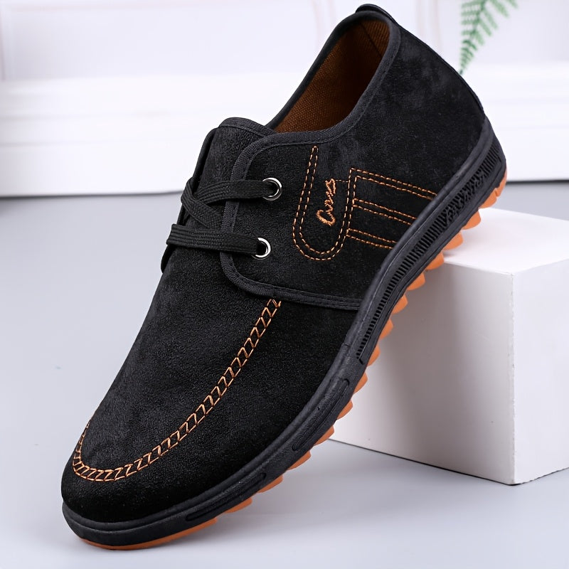 Comfortable men's slip-on canvas shoes in solid colors, ideal for outdoor activities.