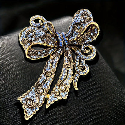 Rhinestone bow brooch pin with a vintage-inspired design - a dazzling fashion accessory to elevate dresses, coats, and bags.