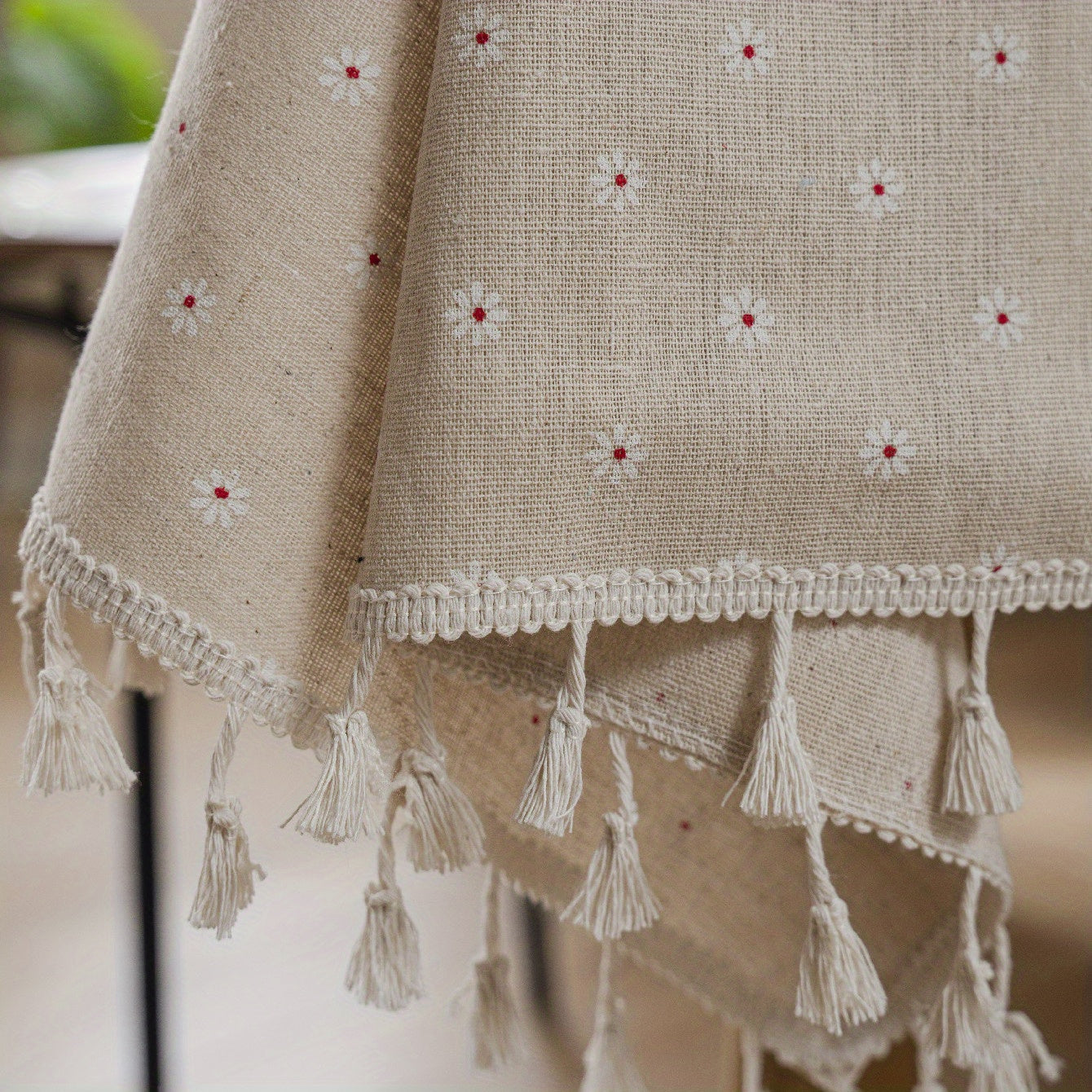 White chrysanthemum and beige linen print farmhouse floral tablecloth with tassels, ideal for kitchen and dining decor. Ready for Thanksgiving, made of polyester, rectangular shape.