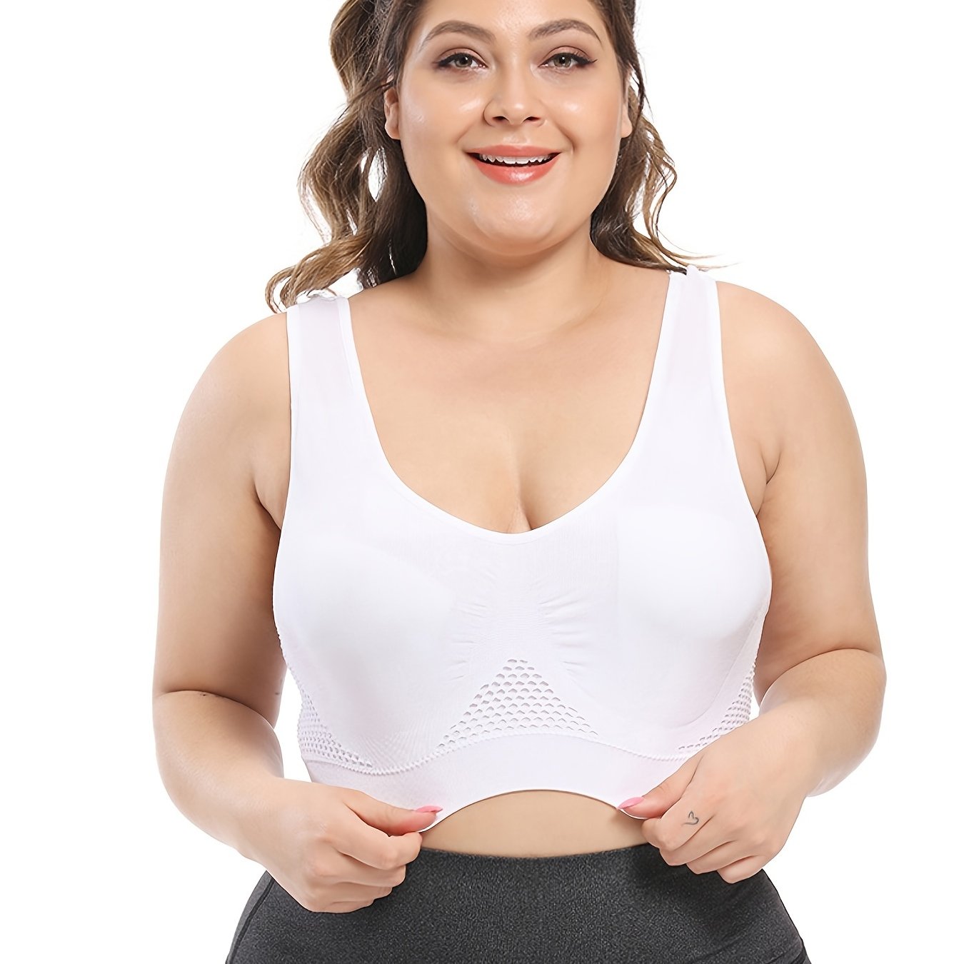 Seamless purple sports bra for plus size women, with breathable mesh fabric, push-up support, removable pads, and comfort fit. Available in sizes 36XL to 40XL.