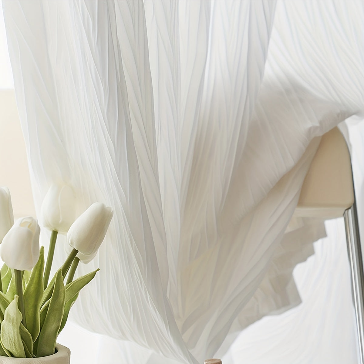 Elegant white sheer curtain with rod pocket, perfect for adding a touch of sophistication to your living room or bedroom décor.