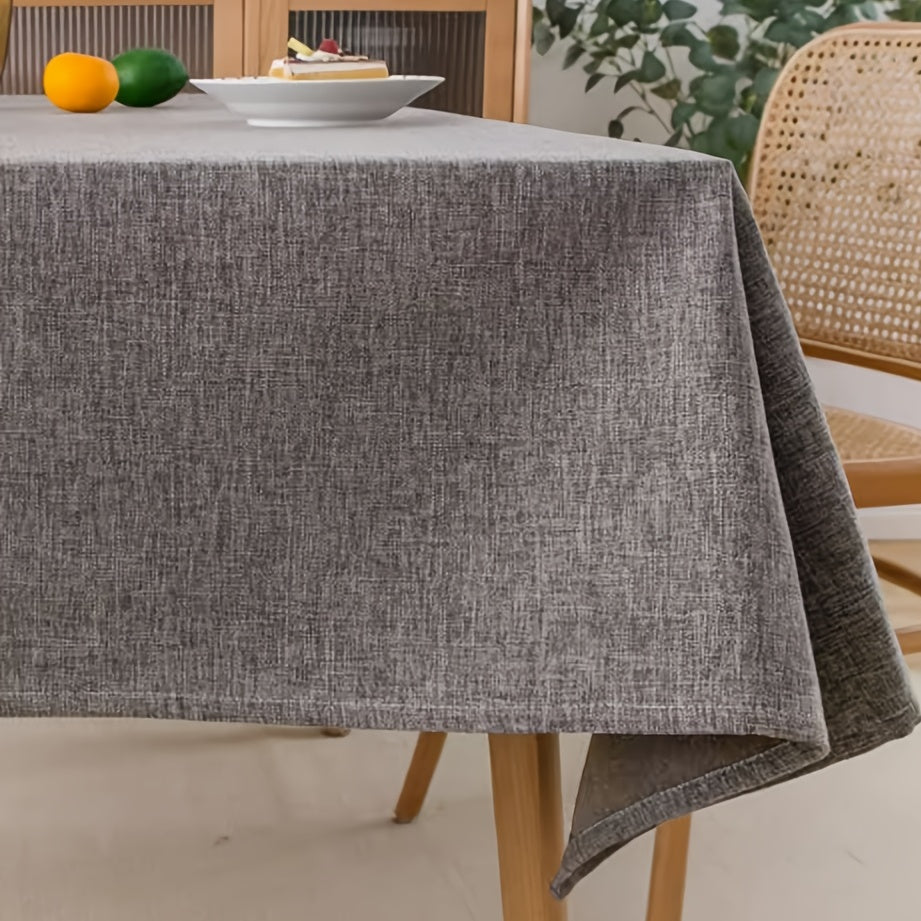 Modern grey polyester tablecloth, waterproof and thickened, machine woven, 100% polyester, for a rectangular dining table.