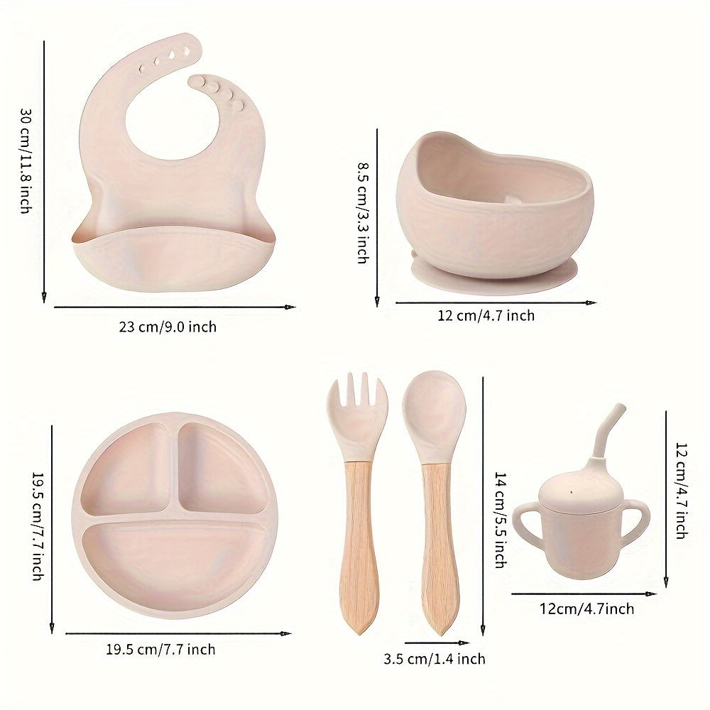 6-piece silicone feeding set with strong suction includes divided plate, wooden spoon and fork, microwave safe - great for self-feeding.