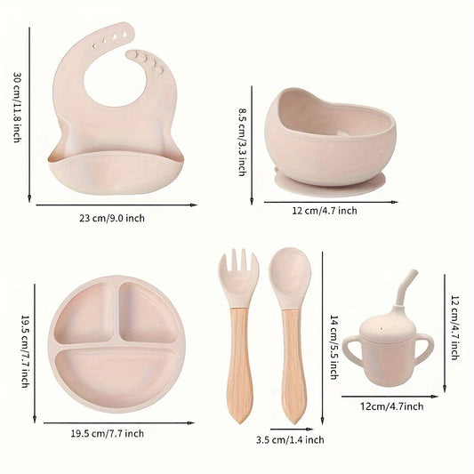 6-piece silicone feeding set with strong suction includes divided plate, wooden spoon and fork, microwave safe - great for self-feeding.