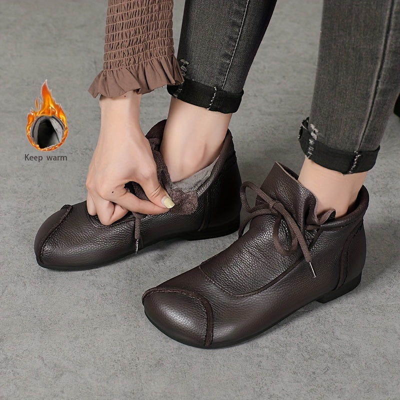 Soft plush-lined women's ankle boots in black, brown, and burgundy, with a cozy slip-on design.