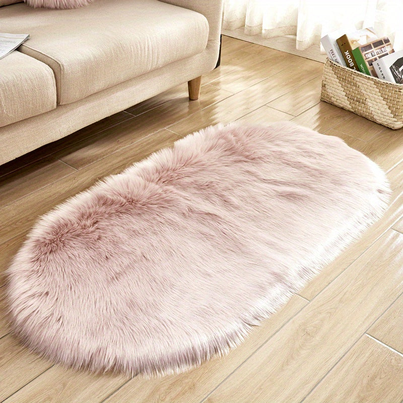 One piece of a luxurious Super Soft Area Rug, featuring a Plush Fluffy Faux Sheepskin design in an Oval shape, perfect for adding warmth to your Living Room or Bedroom. This Machine Washable Bedside Rug is made of Shaggy Plush Carpet Faux material, ideal