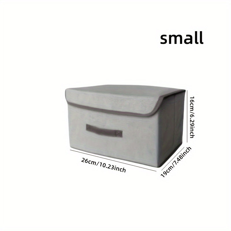 Durable, waterproof foldable storage box for dormitory, clothing, and children's items.