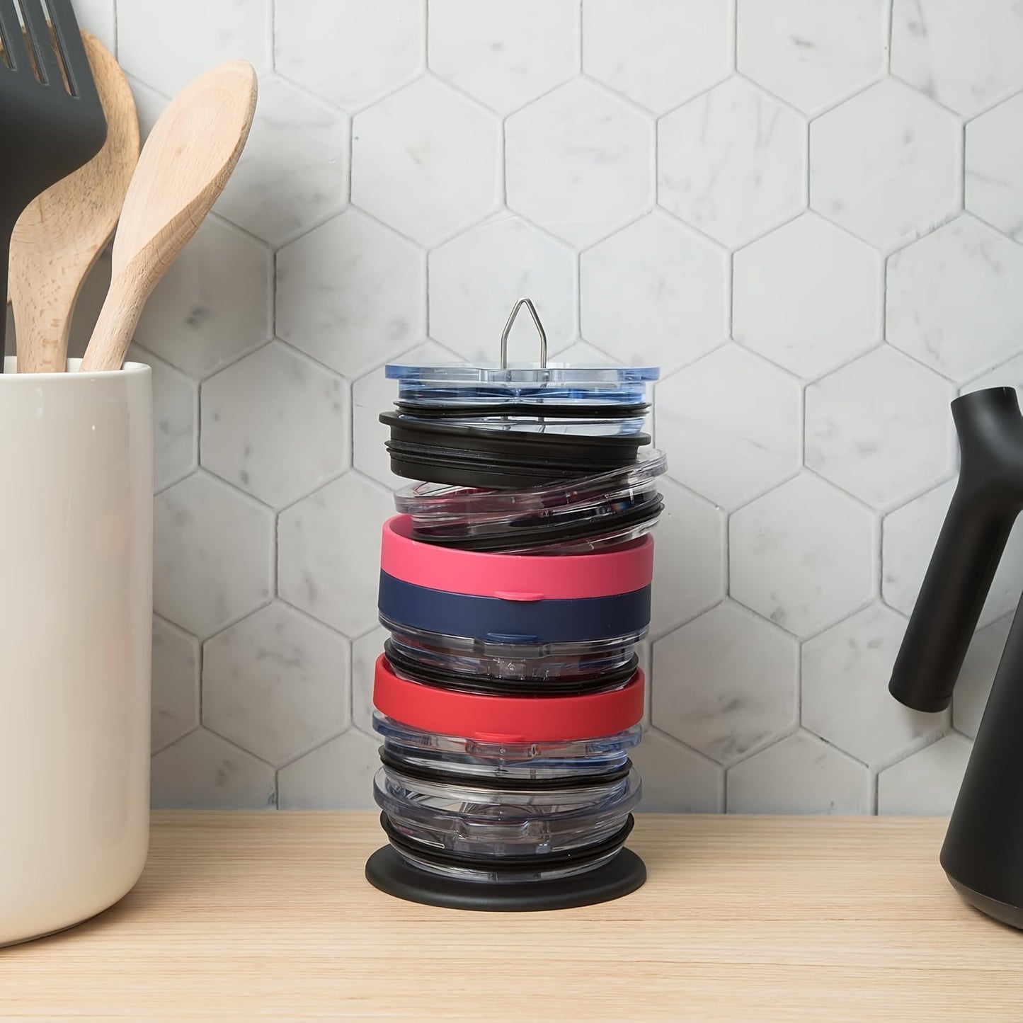 Organize your metal tumbler lids with this vertical cup lid holder featuring a flip design. Suitable for various lid sizes, this non-electric organizer is perfect for saving space in your kitchen counter and cabinets. Comes in a pack of 1.