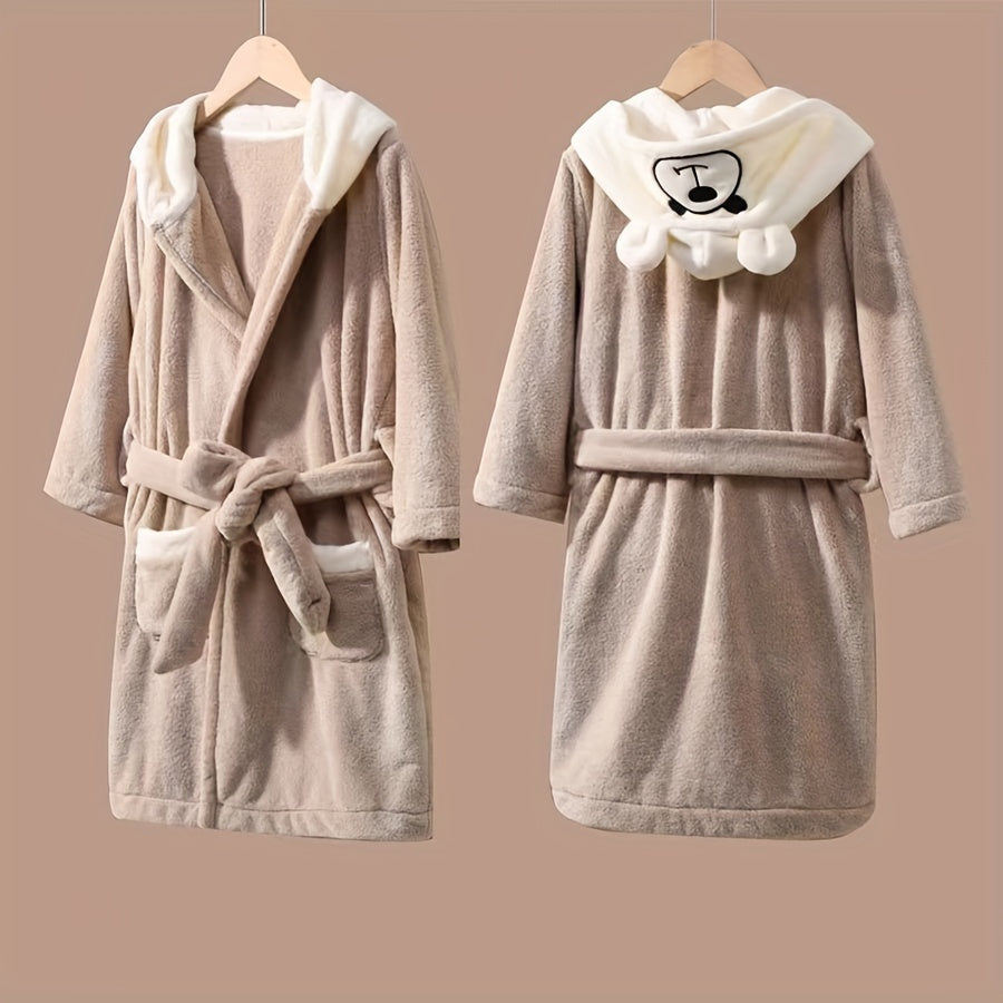 Soft coral fleece bathrobe for kids with hood, cartoon bear design, and thick warmth. Machine washable and perfect for all seasons.