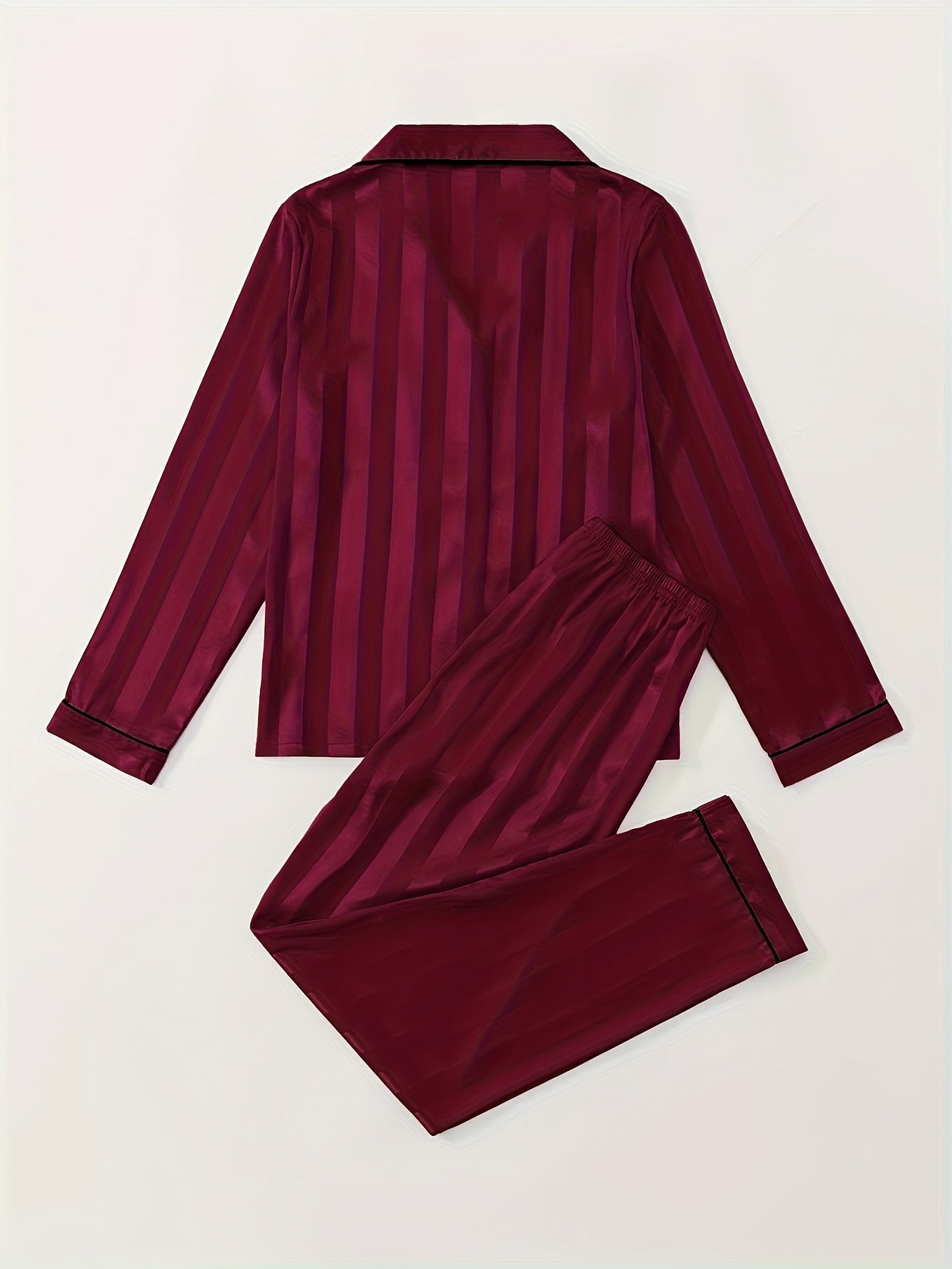 Women's satin pajama set with striped long sleeve top and lounge pants for sleepwear and loungewear.