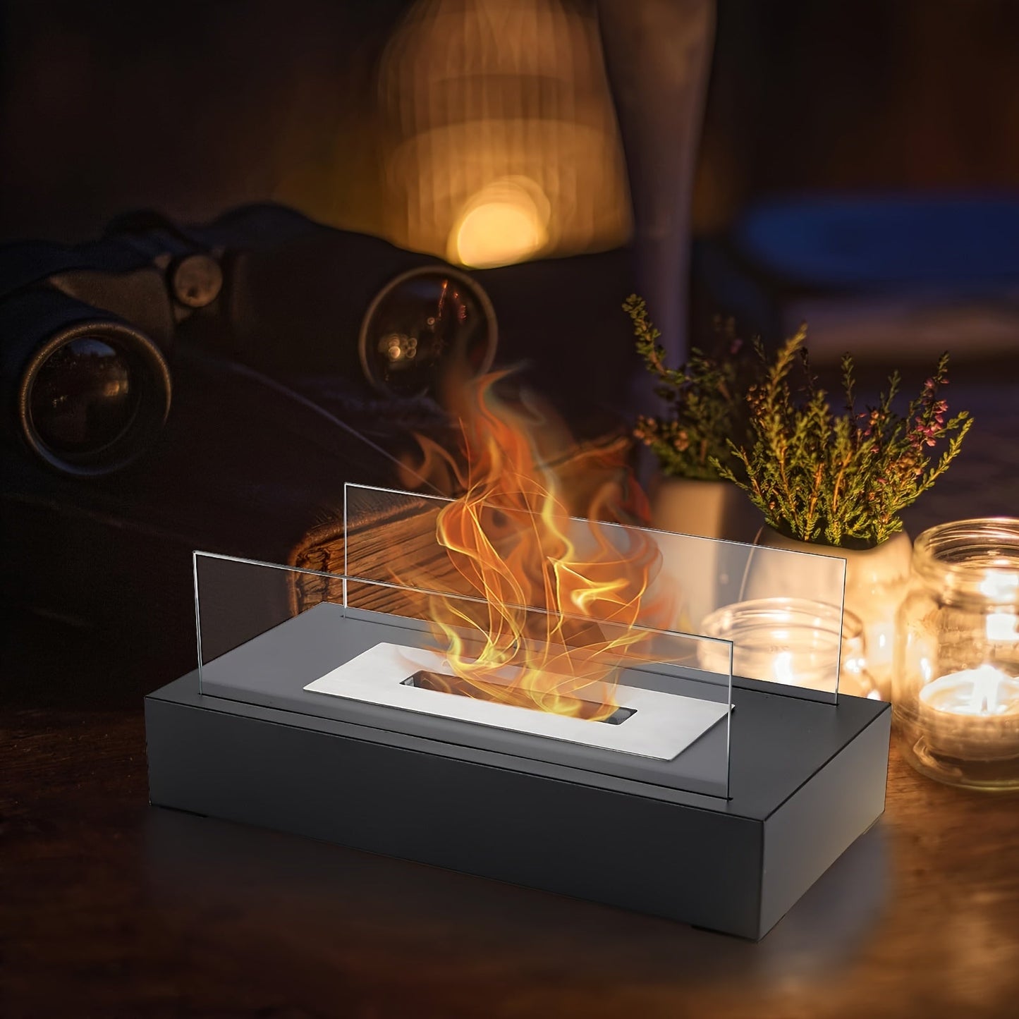 One piece of a Tabletop Fire Pit that is portable and can be used with alcohol. This Bioethanol Tabletop Fireplace is perfect for outdoor camping and has a rectangular shape. It provides a clean burning real flame and is a convenient household gadget.