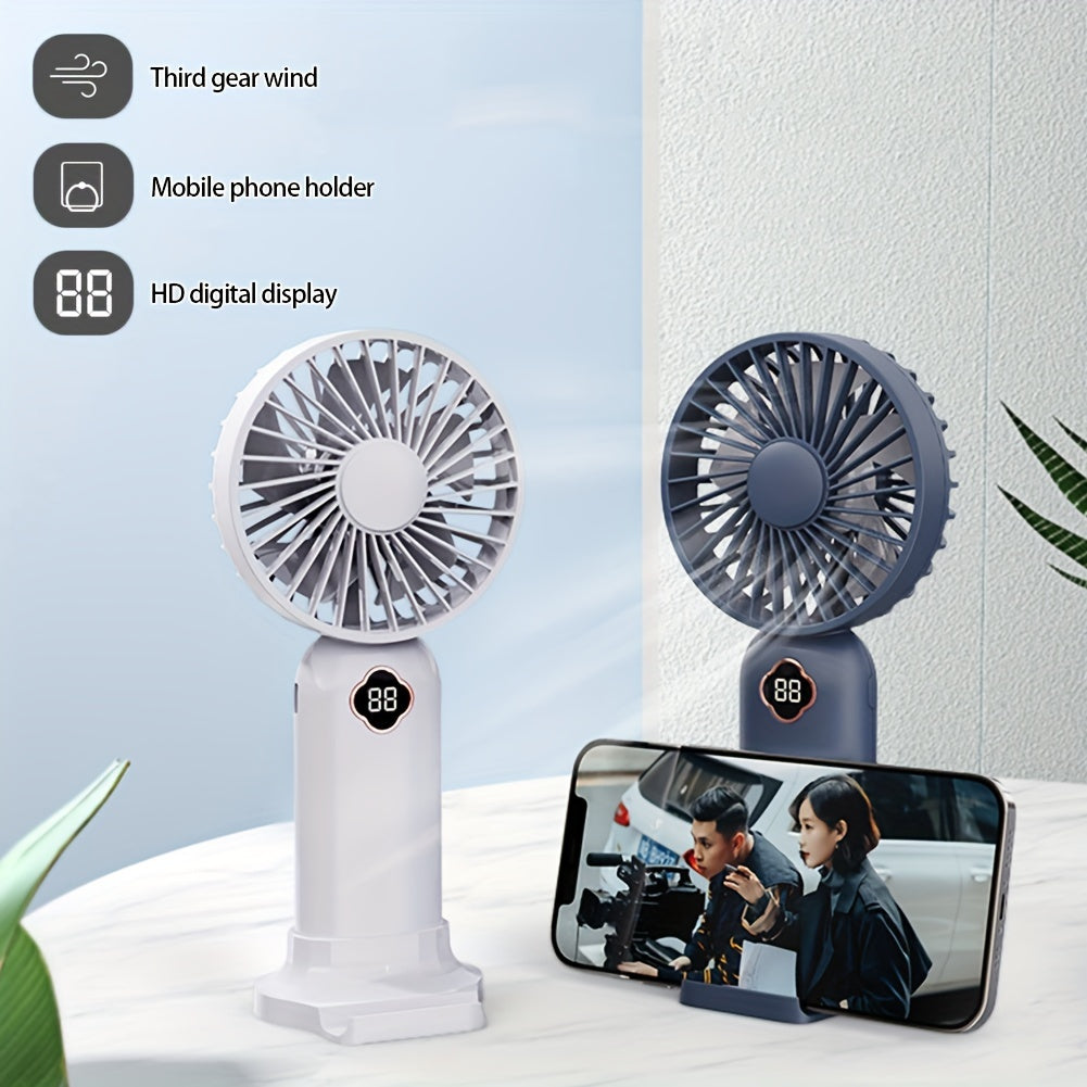 Essential for the summer season, this handheld mini fan with a 1200mAH battery pack is perfect for staying cool during outdoor activities. Measuring 19.71*8.99cm, this silent small fan is a must-have for back-to-school supplies, RV trips, camping