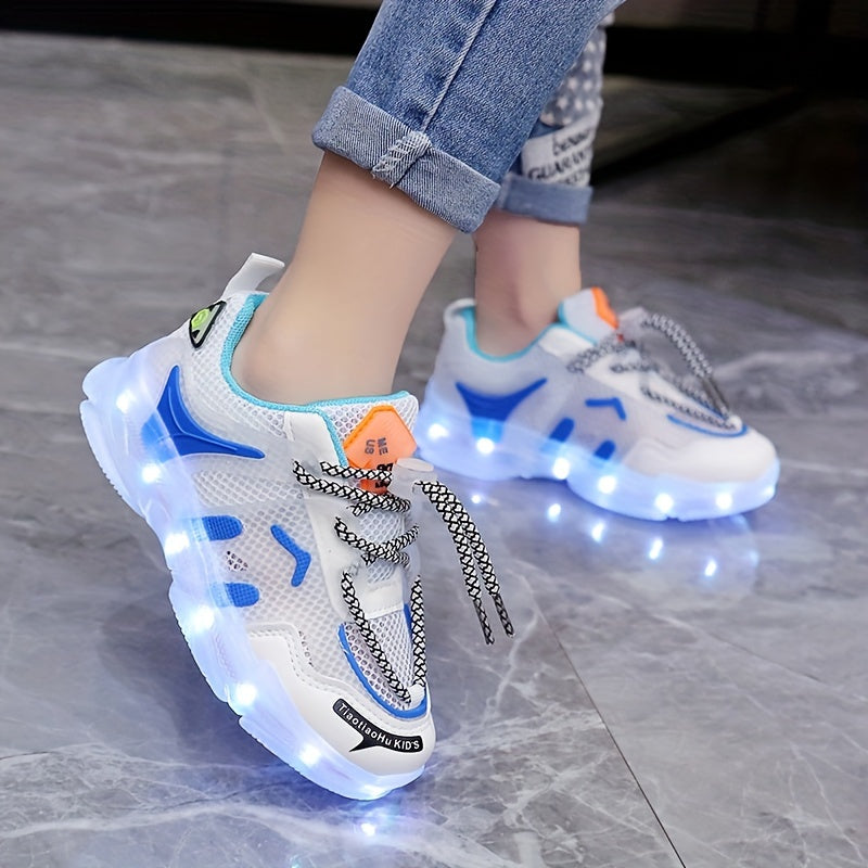 Children's LED light-up sneakers with breathable mesh, non-slip soft sole, and trendy street style for nighttime visibility, ideal for outdoor play and sports in white/blue/orange designs.