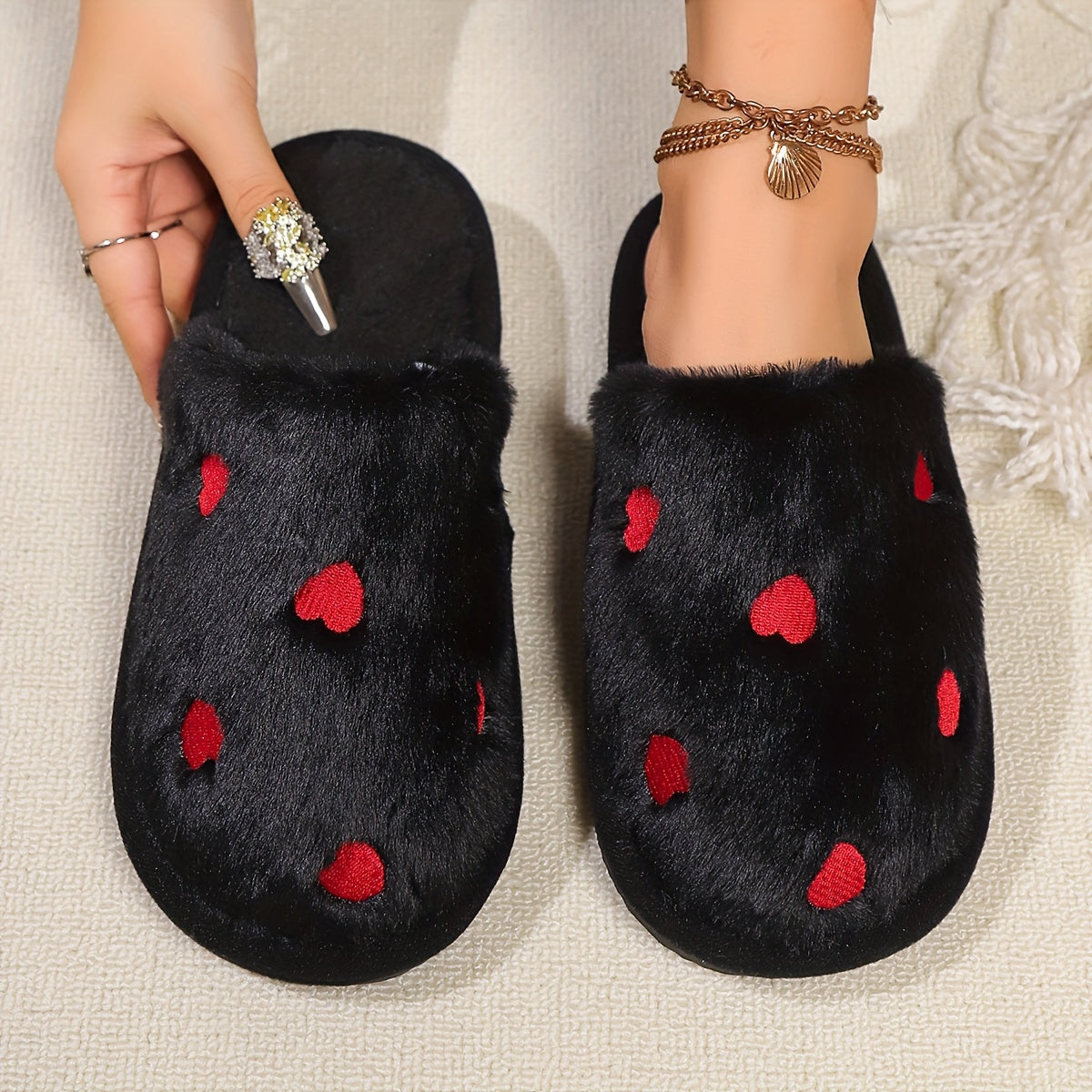 Soft and warm women's winter slippers with heart pattern - cozy and cute design, non-slip sole, hand washable, available in black, white, pink.