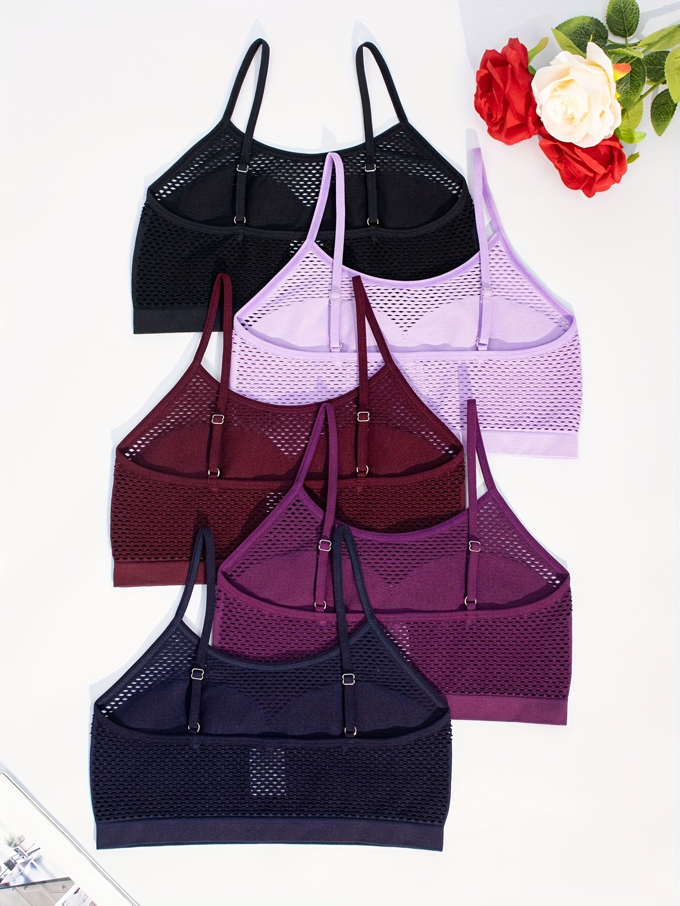 5-Pack of sexy cutout bras made of high support knit fabric (92% Polyamide, 8% Elastane), featuring a breathable seamless fishing net style with no padding or wires. Ideal for women.