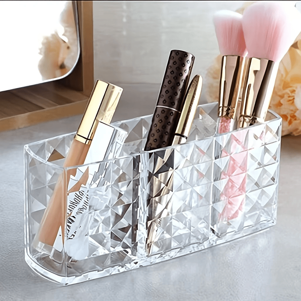 3-compartment clear makeup organizer made of polished acrylic; lightweight and hypoallergenic; perfect for storing brushes, eyebrow pencils, and lipsticks. No installation required.