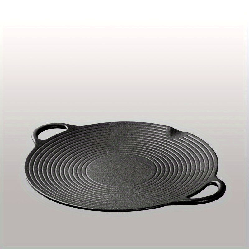 Single non-stick skillet made of cast iron with two handles for grilling and frying. Can be used on gas and induction stoves. Handwashing recommended.