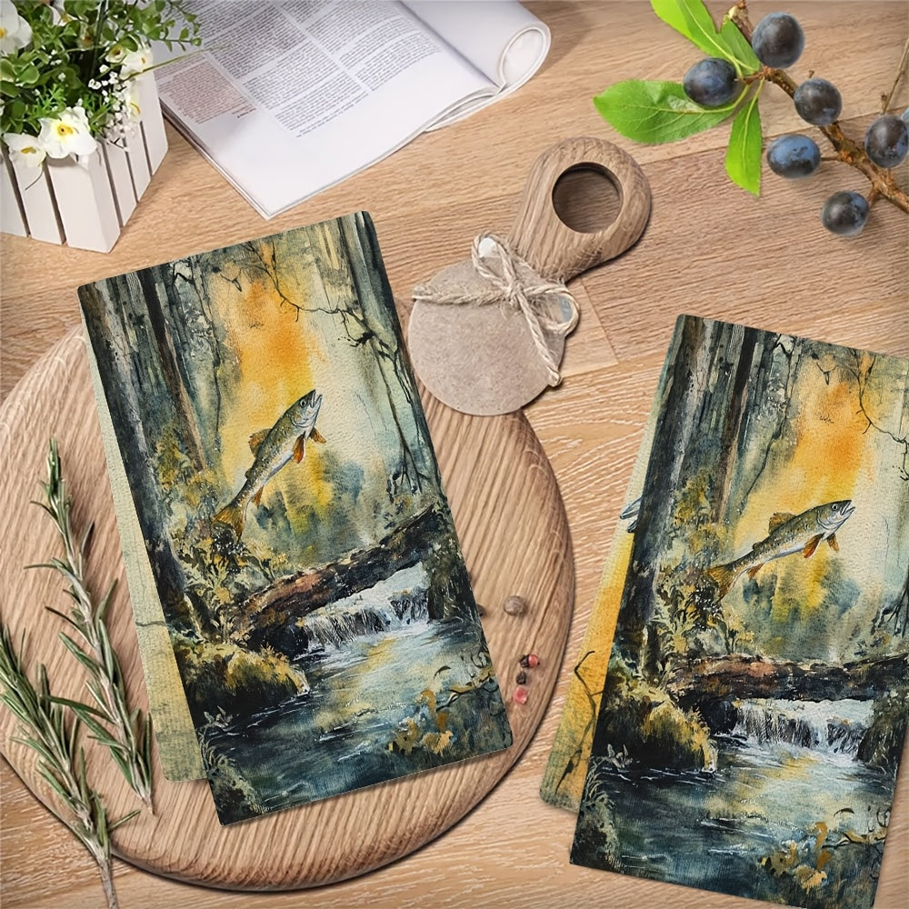 Two pieces of ultra soft kitchen towels featuring a serene forest stream and salmon jump design. These highly absorbent towels are machine washable and perfect for drying dishes or hands. With a contemporary style, each towel measures 40.64x60.96 cm.