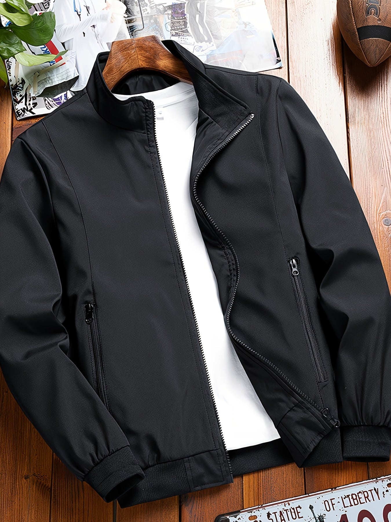 New model men's plus size jacket with trendy solid color, stand collar, zip closure, and pockets. Ideal for spring and fall, suitable for business casual.