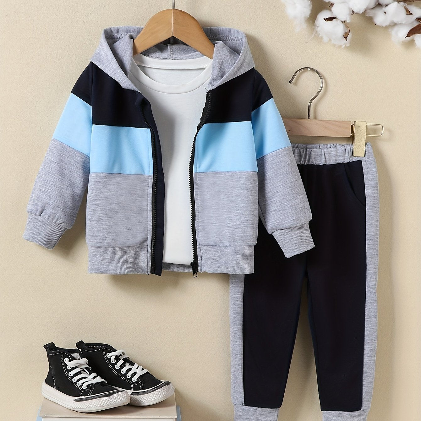 Affordable boys' hoodie and pants set with colorful design.