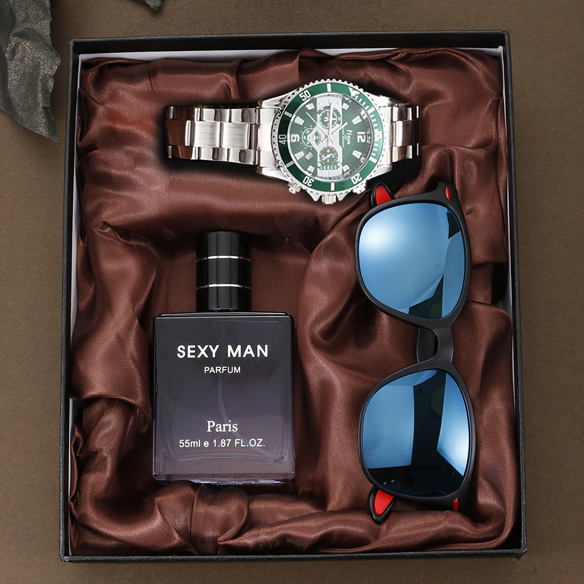 Trendy 3-piece men's gift set with watch, sunglasses, and perfume, ideal for holiday gifting.