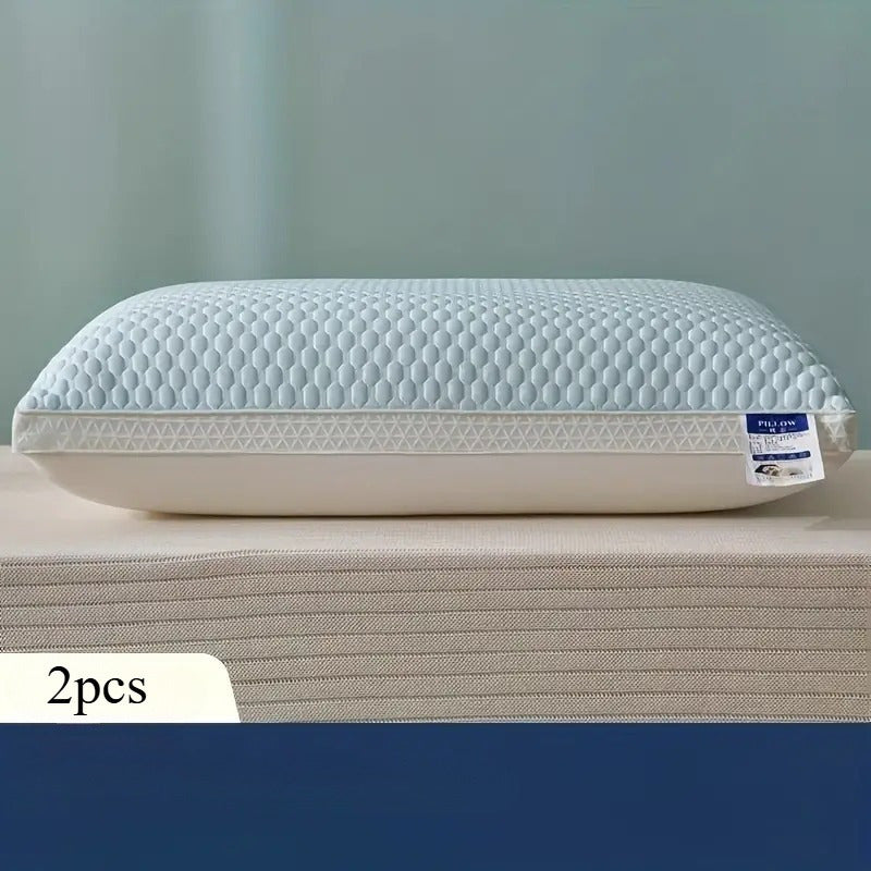 Two cooling tofu pillows designed for neck and spine support. These pillows also provide a relaxing sleep massage and feature breathable, moisture-wicking properties. Perfect for adding a decorative touch to your living room or bedroom.