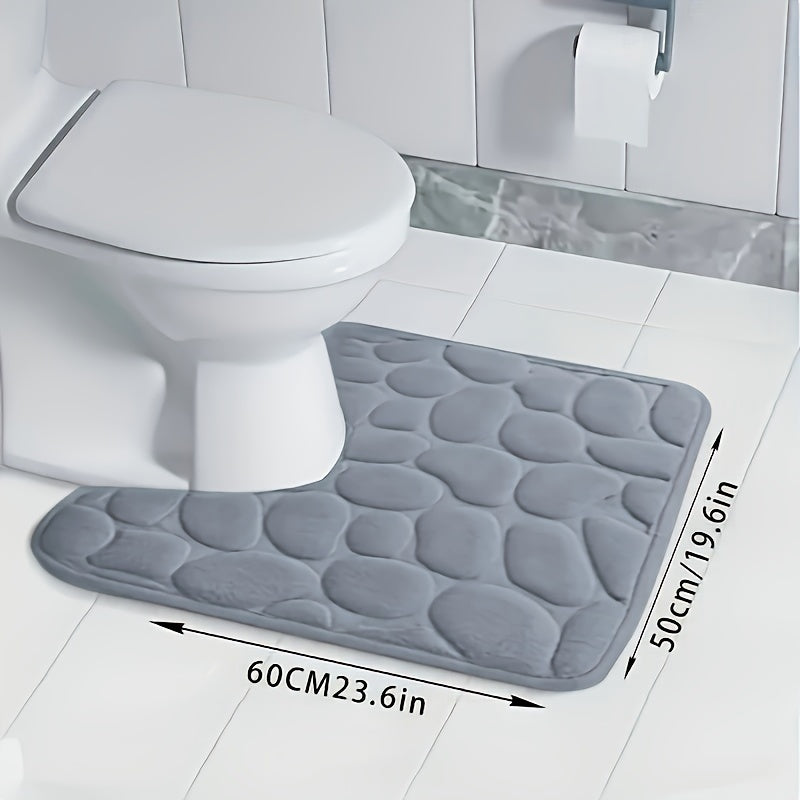 Soft and absorbent memory foam bathroom mat with non-slip backing. Machine washable and quick-drying. Suitable for bathroom, kitchen, laundry, bedroom, and shower.