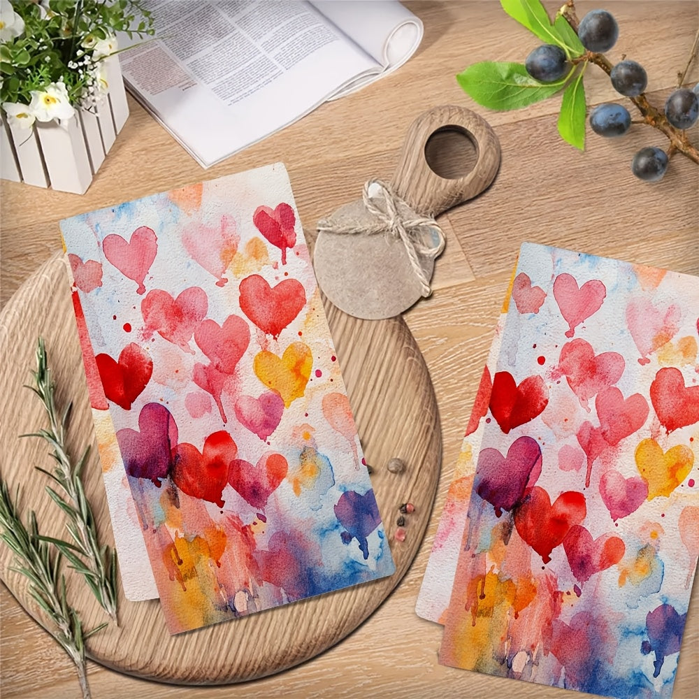 Set of 2 Ultra Soft Kitchen Towels featuring a Valentine's Day Heart Splash Design. These towels are highly absorbent, machine washable and measure 40.64x60.96 cm. They have vibrant watercolor hearts perfect for adding a festive touch to your home decor.