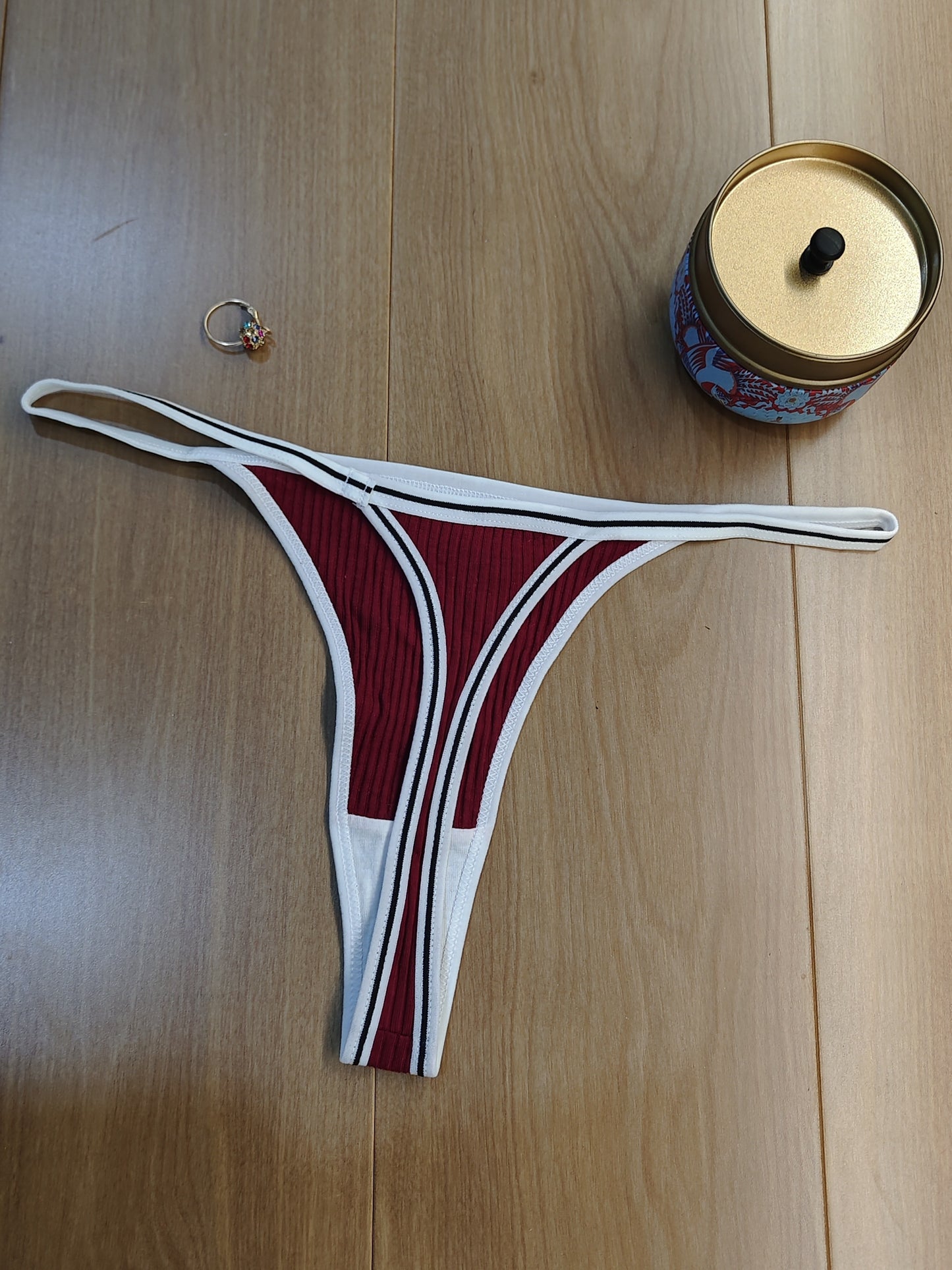 Women's low waist thongs with colorblock stripe print, perfect for sexy lingerie.