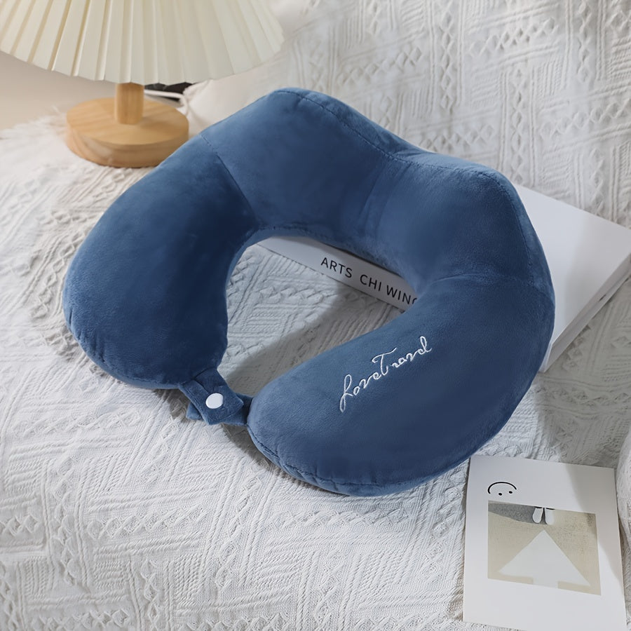 Soft and portable travel pillow in U shape, perfect for neck support on planes, trains, and cars. Ideal for a comfortable rest while traveling.