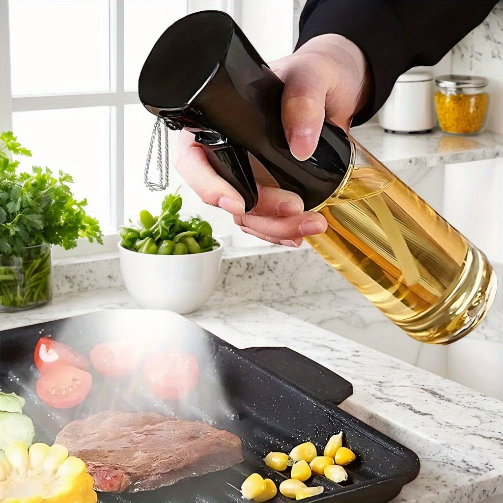 Oil spray bottle for home use, ideal for cooking, suitable for various uses in the kitchen.