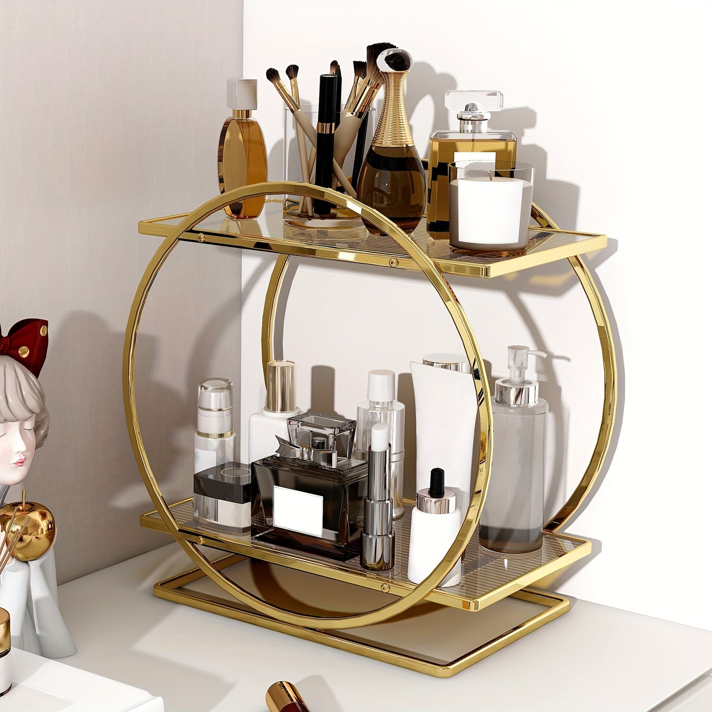 Golden cosmetics storage rack with 2 tiers made of rust-proof cast iron. Large capacity for skincare, lipstick, perfume, and more. Circular design for bathroom and makeup area.