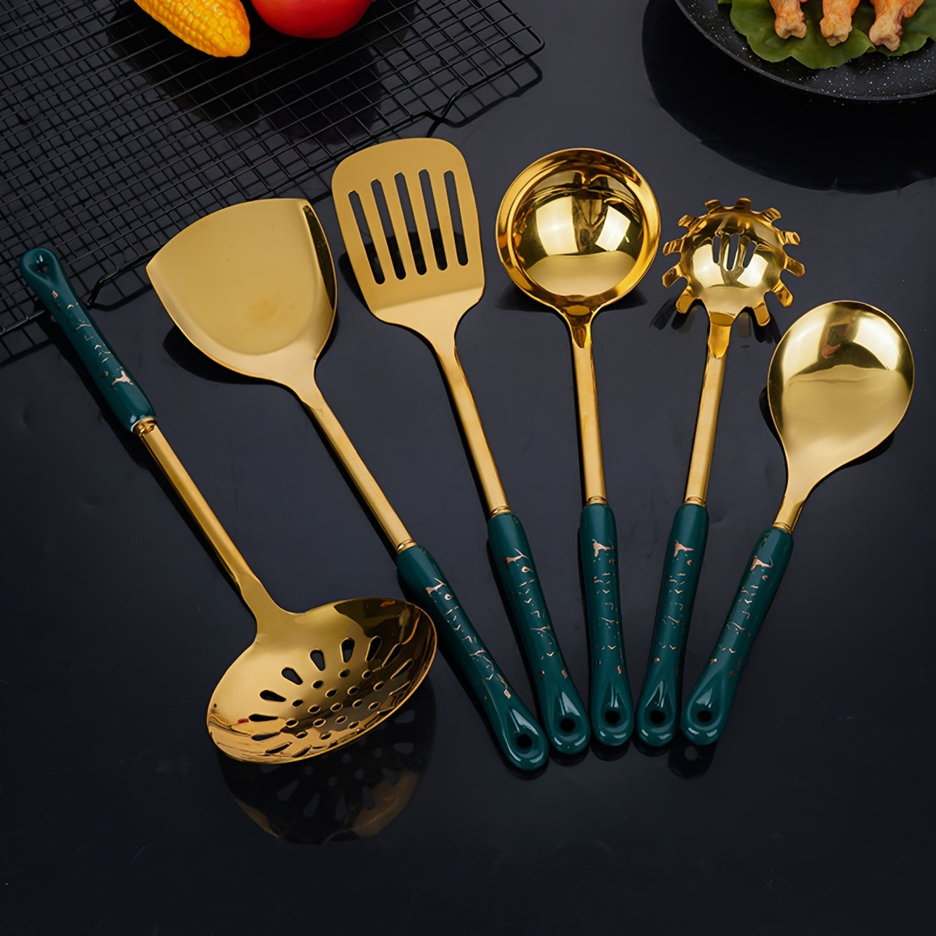 Set of seven pieces of stainless steel kitchenware, consisting of essential kitchen supplies.