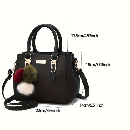 Stylish black handbag with golden-tone hardware and random ball charm, can be used as a versatile shoulder or crossbody bag for women. Ideal for travel, casual outings, and gift giving.