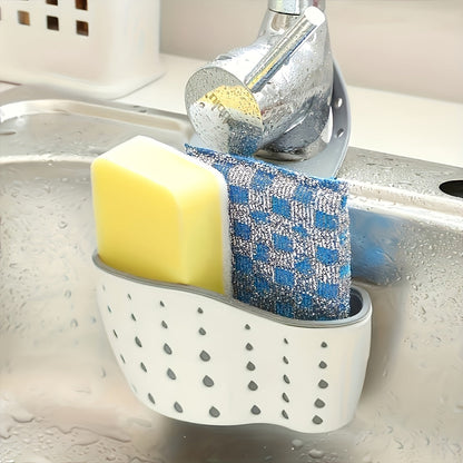 Get organized in the kitchen with the 1pc Modern Plastic Kitchen Sink Drain Basket. This versatile and adjustable hanging rack is perfect for storing sponges, soap, and cleaning tools. The perforated design allows for efficient draining and is ideal for