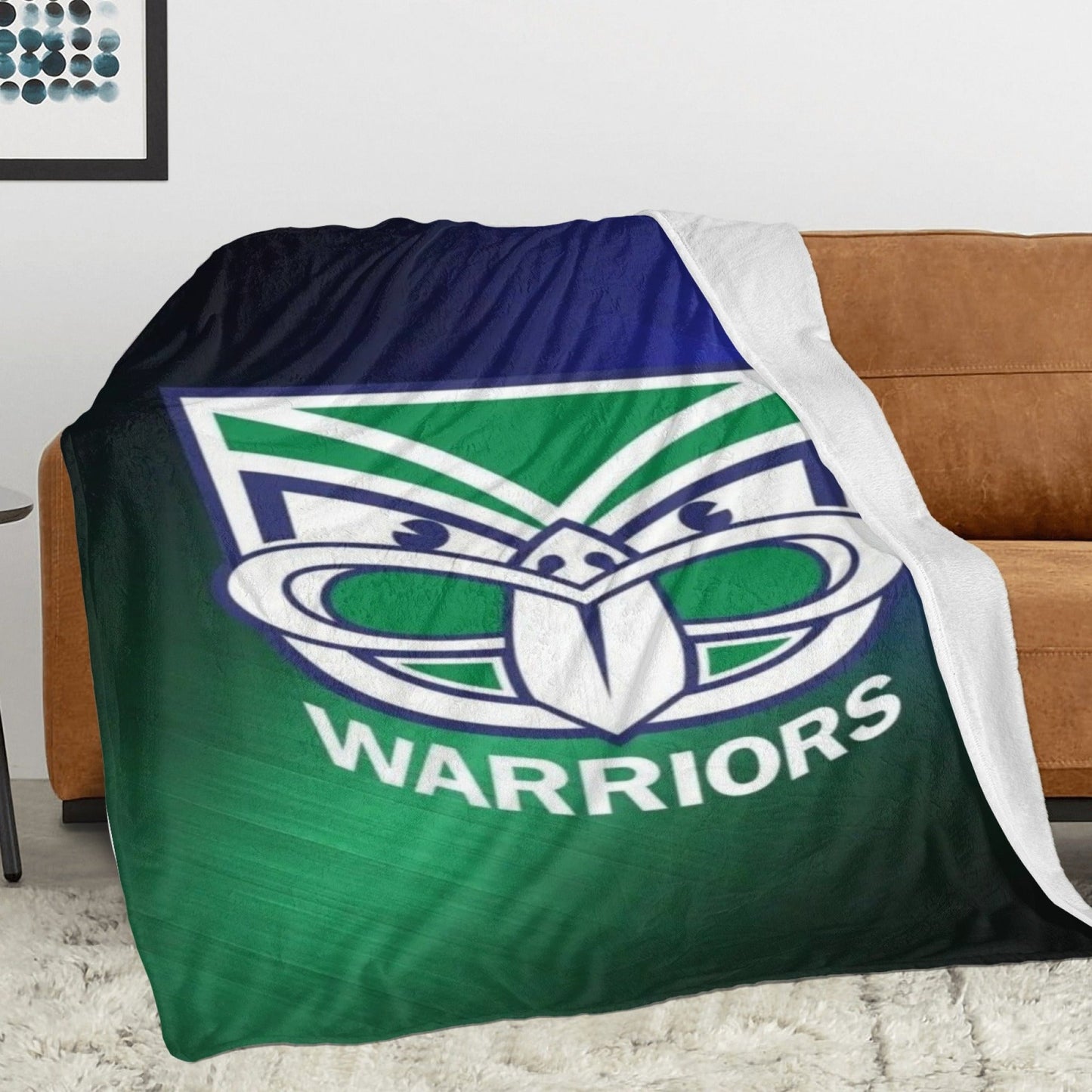 Get cozy with this ultra-soft flannel blanket inspired by the New Zealand Warriors. Featuring a dual-sided design, this all-season blanket is durable and easy to care for. Made from 100% polyester, it is perfect for the sofa, living room, bedroom