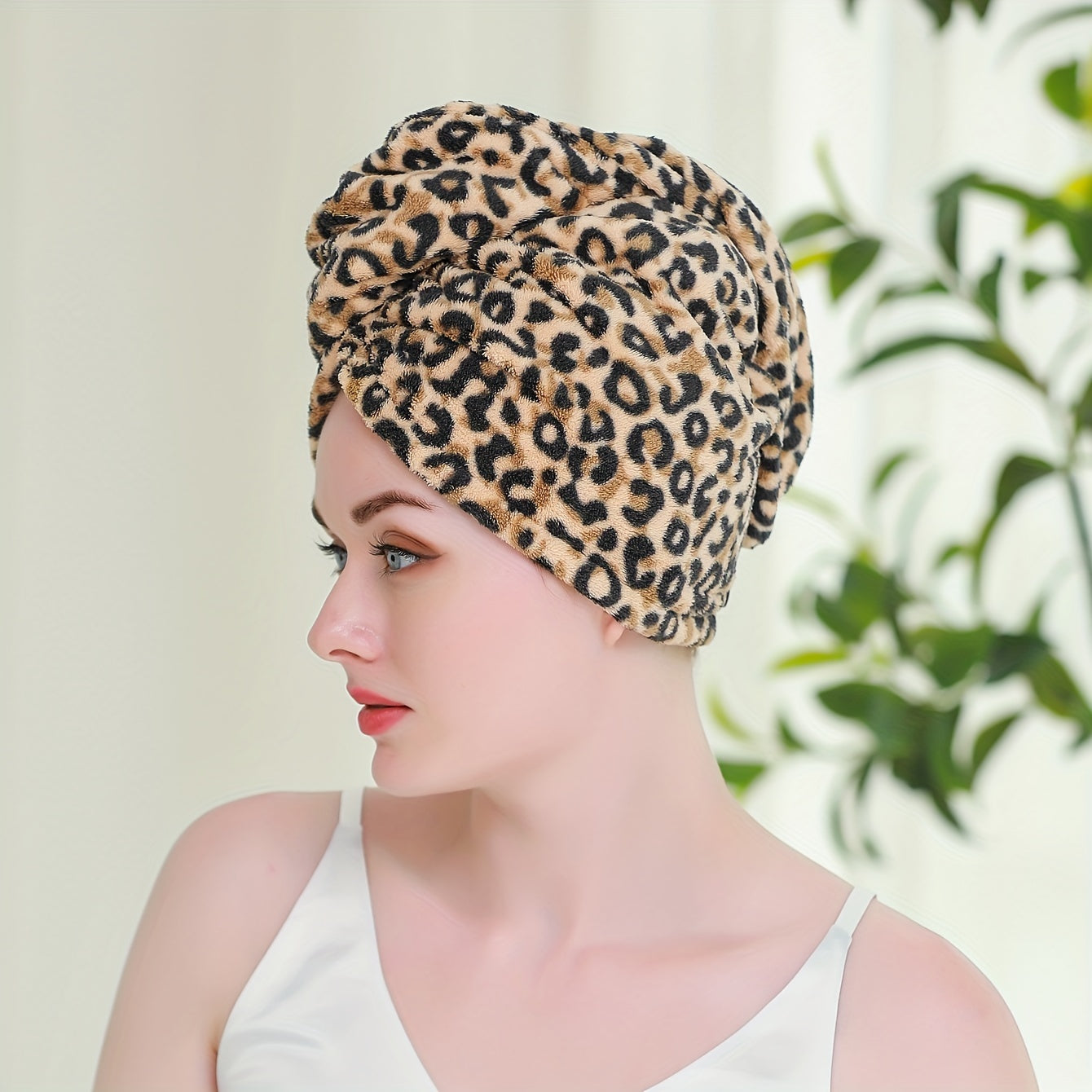 Leopard printed hair drying cap for women, absorbent and quick-drying, perfect for bathroom use.