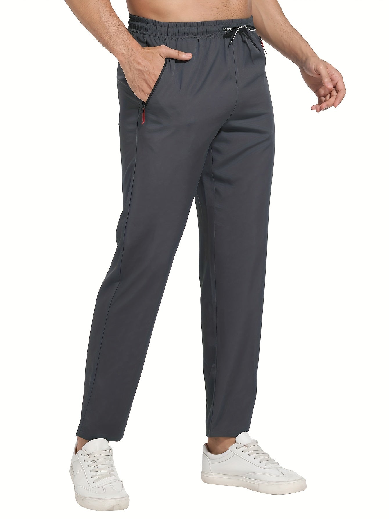 Breathable quick-dry joggers for men with drawstring, zipper pockets, stretchy, lightweight design for running, training, and outdoor activities by EIKELAND Oakspirit.