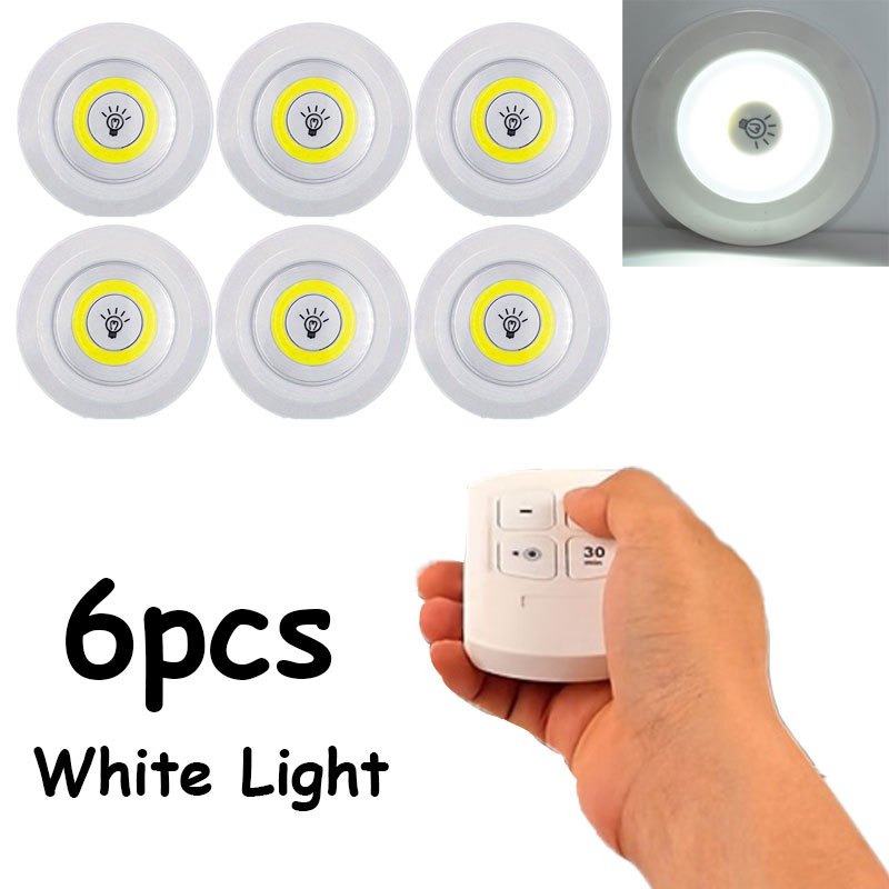 6 Motion Sensor LED Lights in 3 piece set, wireless COB under-cabinet lighting made of plastic. Battery powered with remote control for use in wardrobe, stairs, kitchen. Batteries not