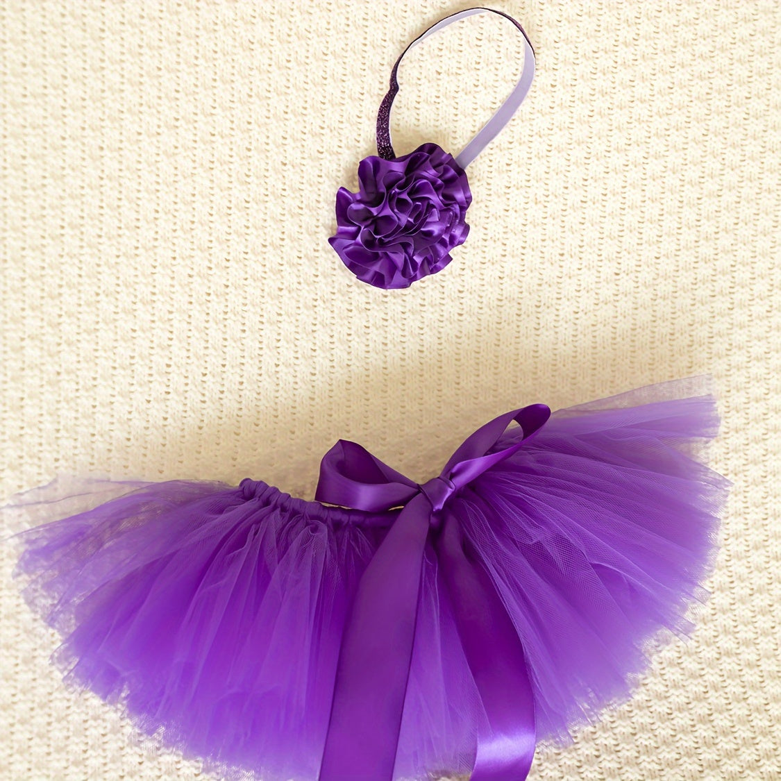 Baby Tutu Set in Purple – Includes Tutu Skirt and Headband made of Polyamide Tulle for ages 0-3, complete with coordinating Flower Headpiece. Perfect for Baby Photo Shoots, Ballet Performances, or as a Birthday and Special Occasion Costume.