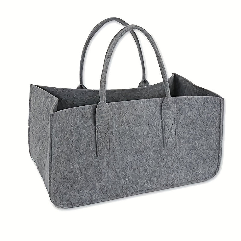 Firewood Carrier Bag made of durable felt material, perfect for transporting logs outdoors. Features handles for easy carrying and can also be used as a multipurpose tote. Ideal for use with fireplaces.