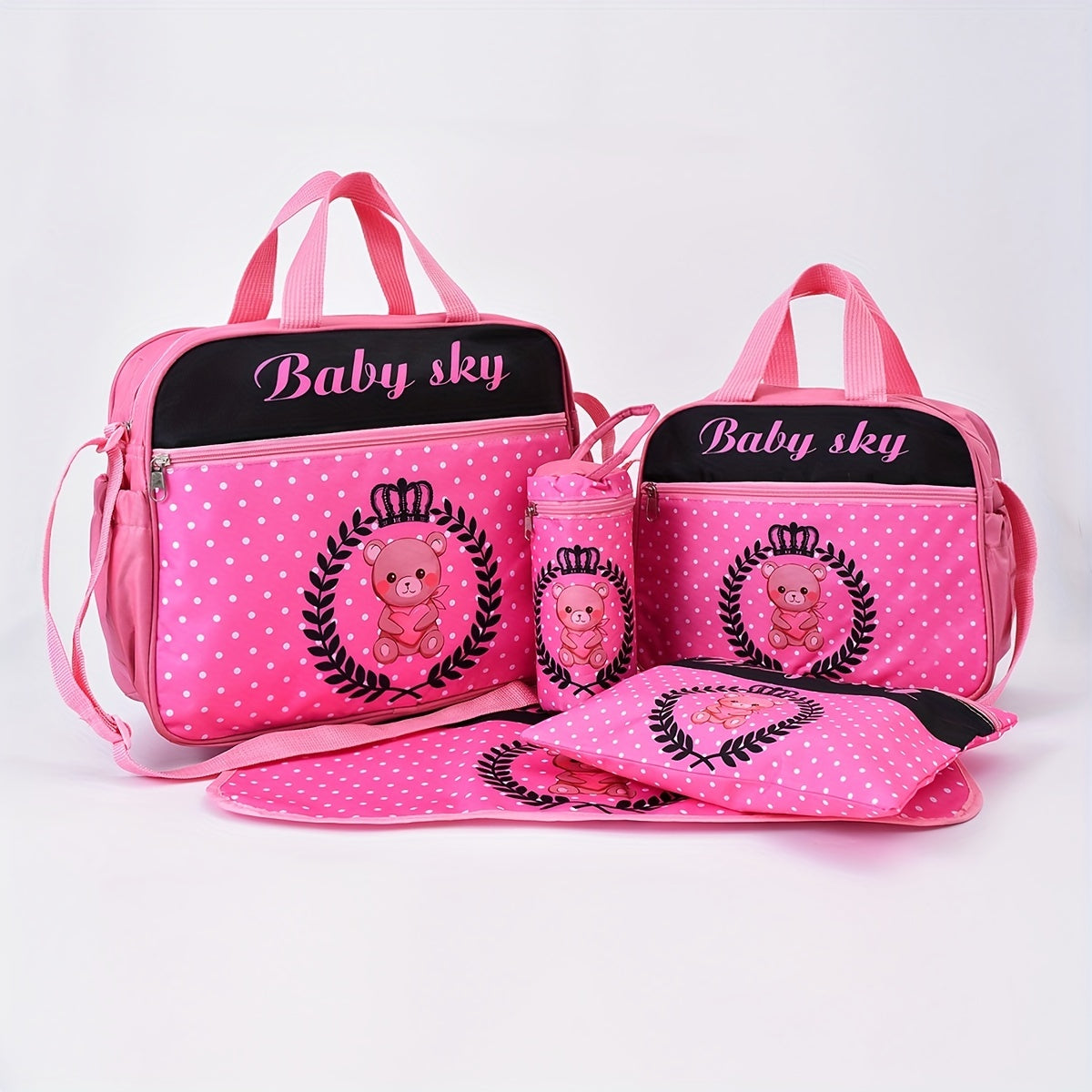 Five-piece set of fashionable bear-printed mommy bags with large capacity, featuring a multifunctional design for carrying as a one-shoulder messenger bag or diaper bag.