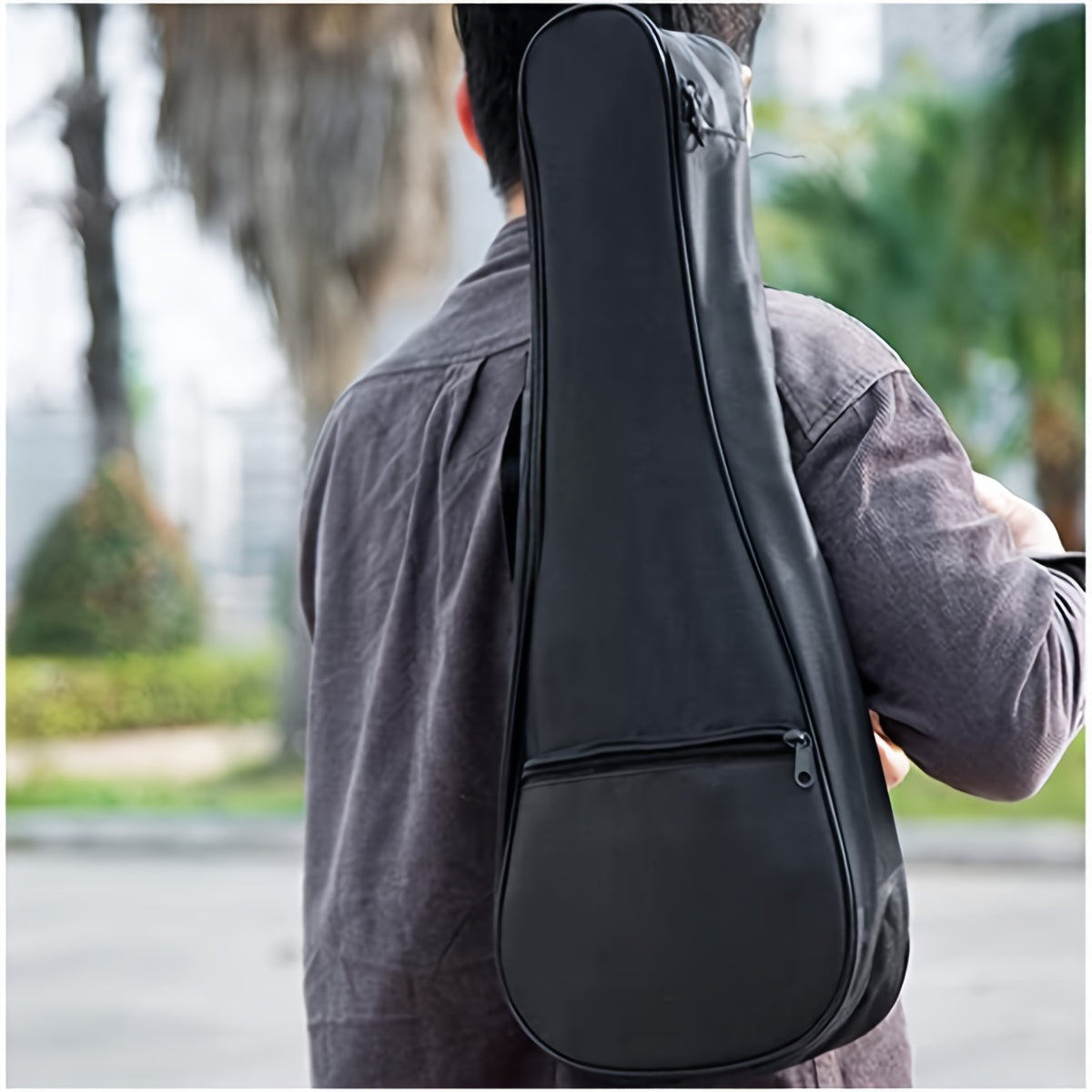 Premium black ukulele case with adjustable straps, fits soprano and tenor ukuleles of various lengths. Suitable for concerts. Ukulele not included.