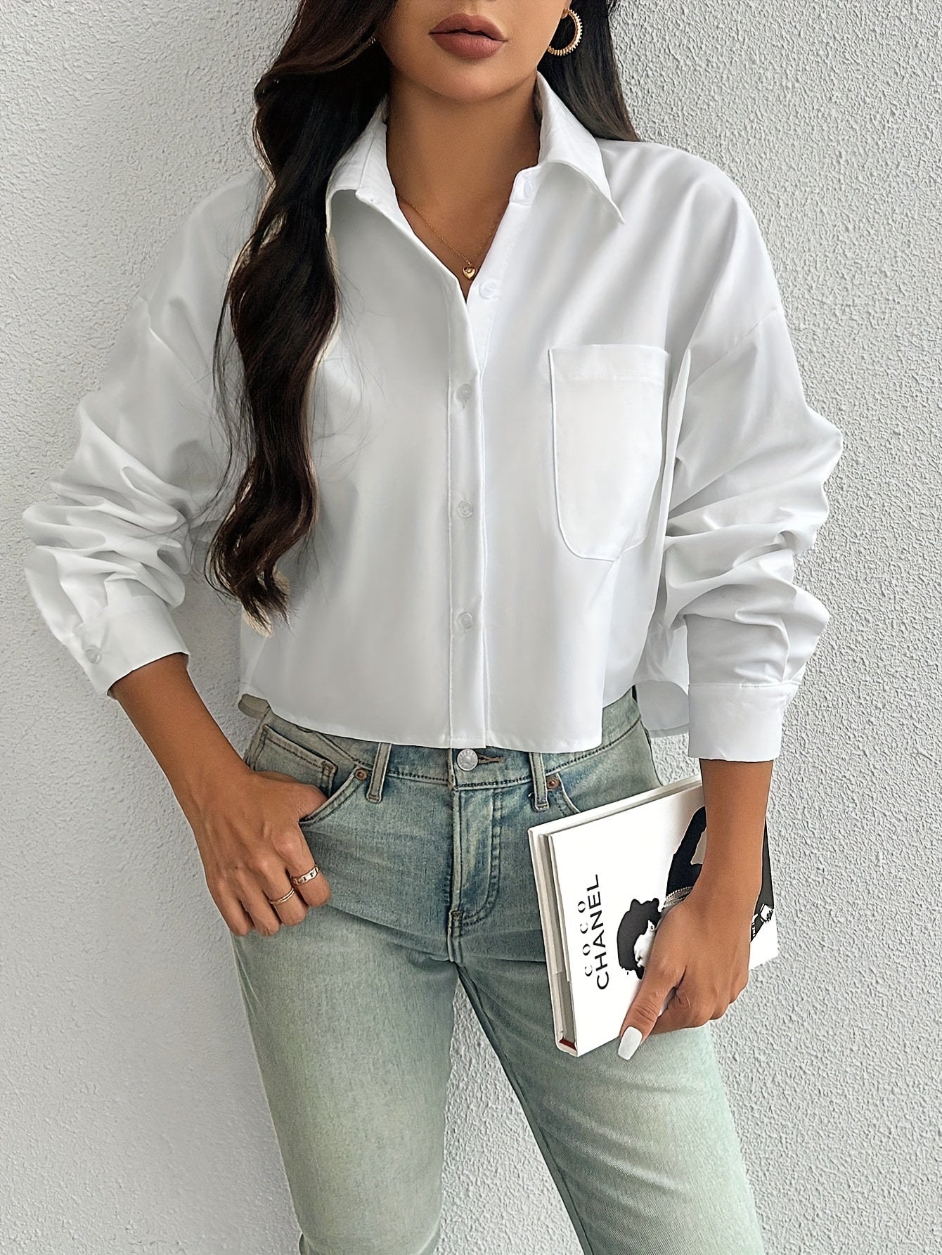 Stylish white casual shirt for women, drop shoulder, long sleeve, short style with pocket, button-up, made of 100% polyester, machine washable, ideal for casual wear.