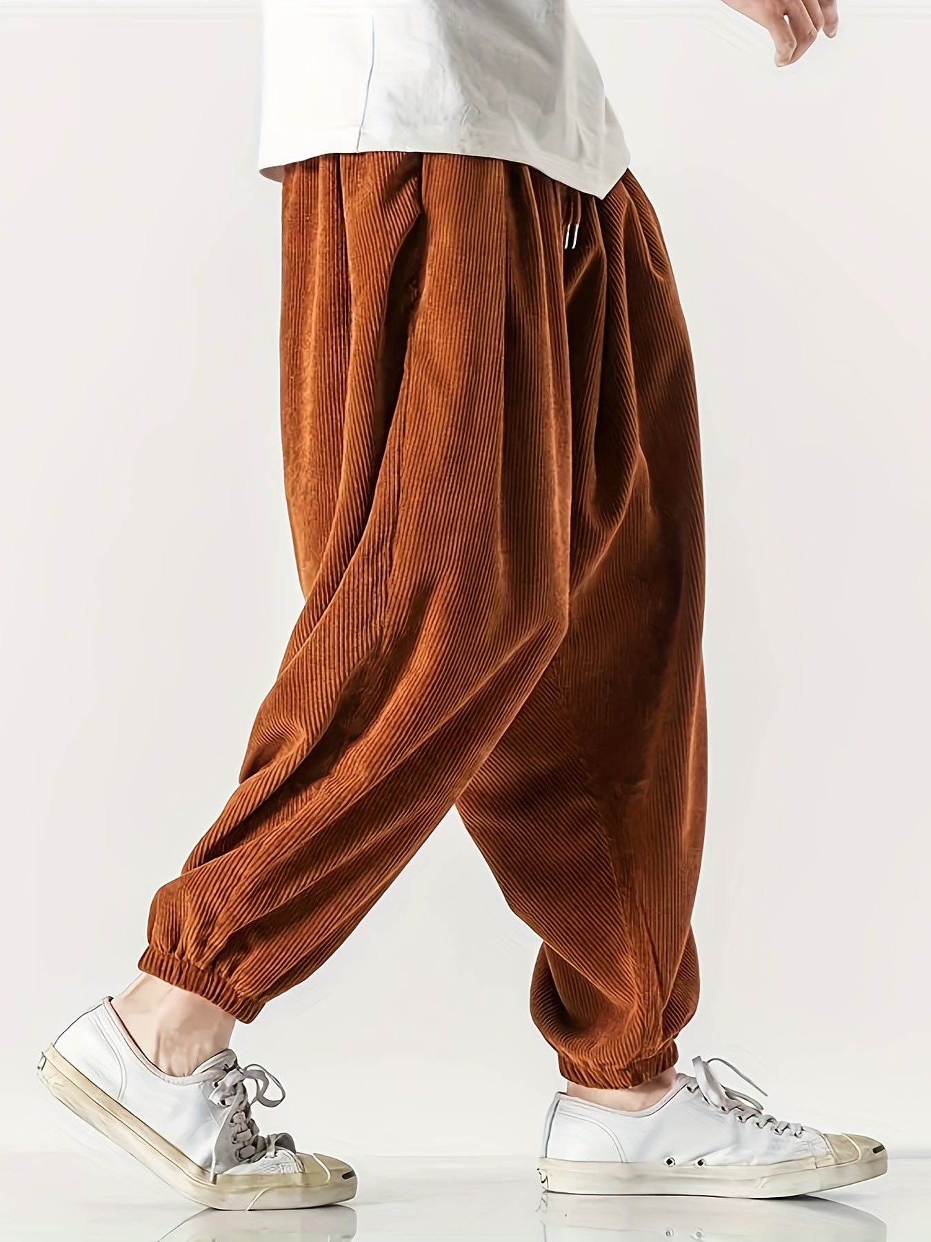 Men's wide leg corduroy pants with drawstring, chic and comfy for spring and fall.