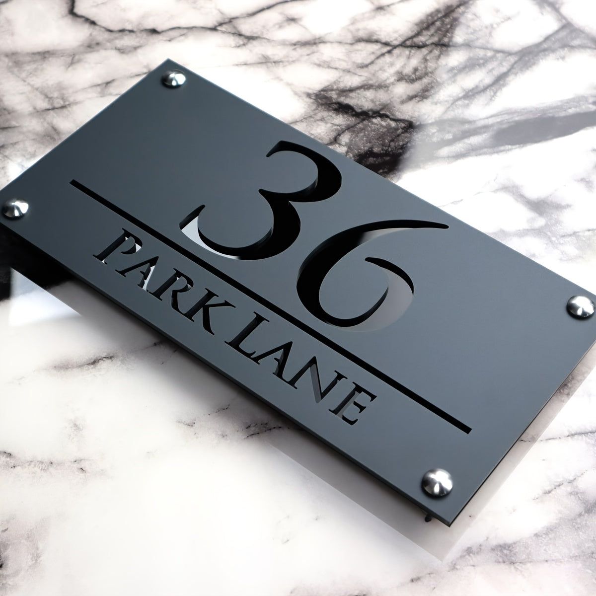 Customized laser-cut acrylic door sign with floating 3D design for outdoor use.