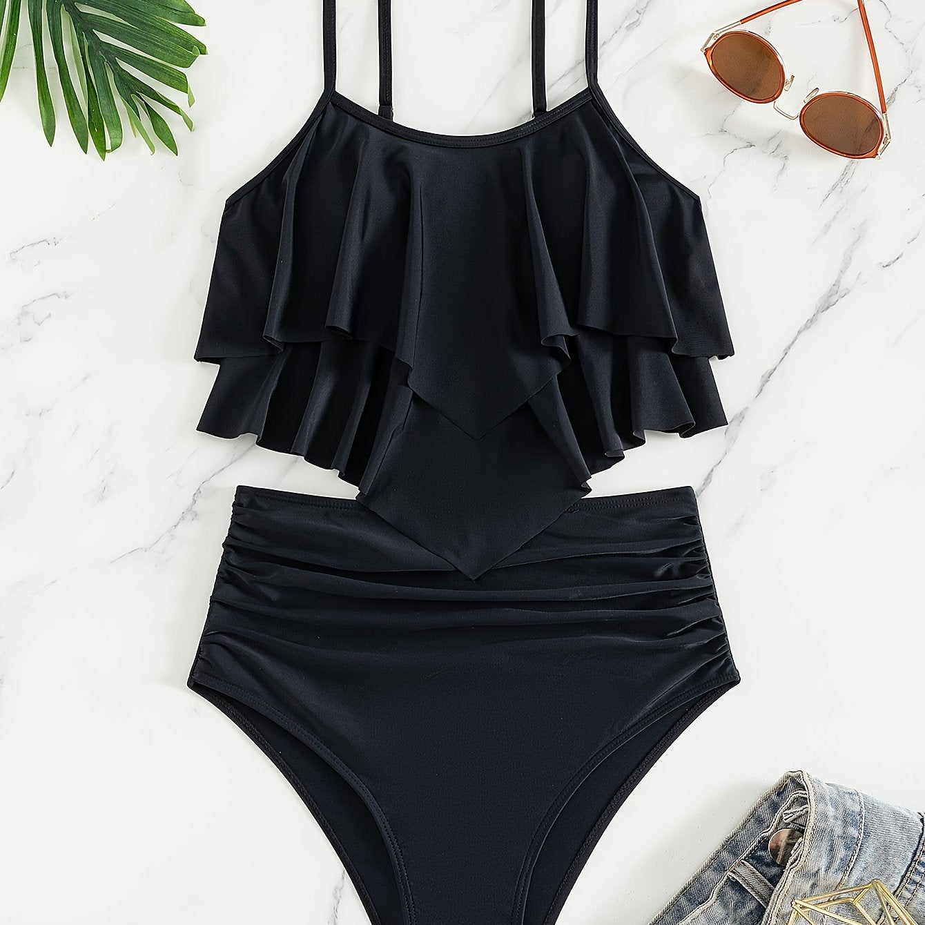 Layered ruffle black 2-piece tankini set with stretchy high-waist bottoms. Perfect for women's swimwear and clothing.